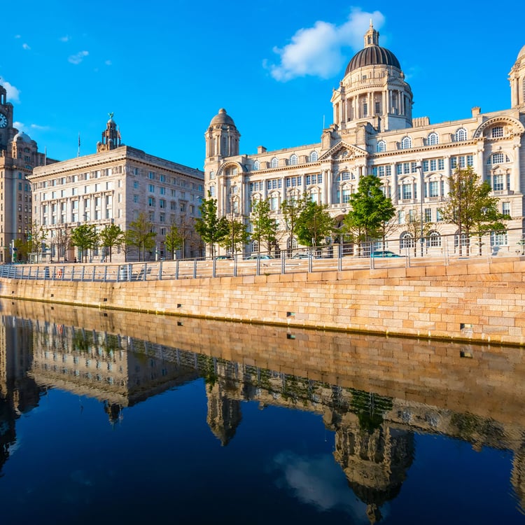 Liverpool, UK - May 18 2018: Liverpool Pier Head with the Royal Liver Building, Cunard Building and Port of Liverpool Building part of the Liverpool Maritime Mercantile City UNESCO World Heritage Site