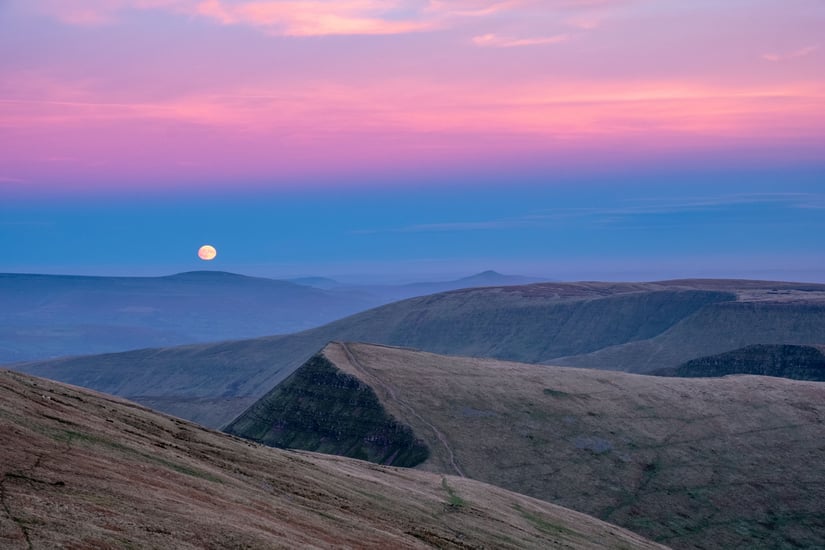 Moonrise over brecon beacons