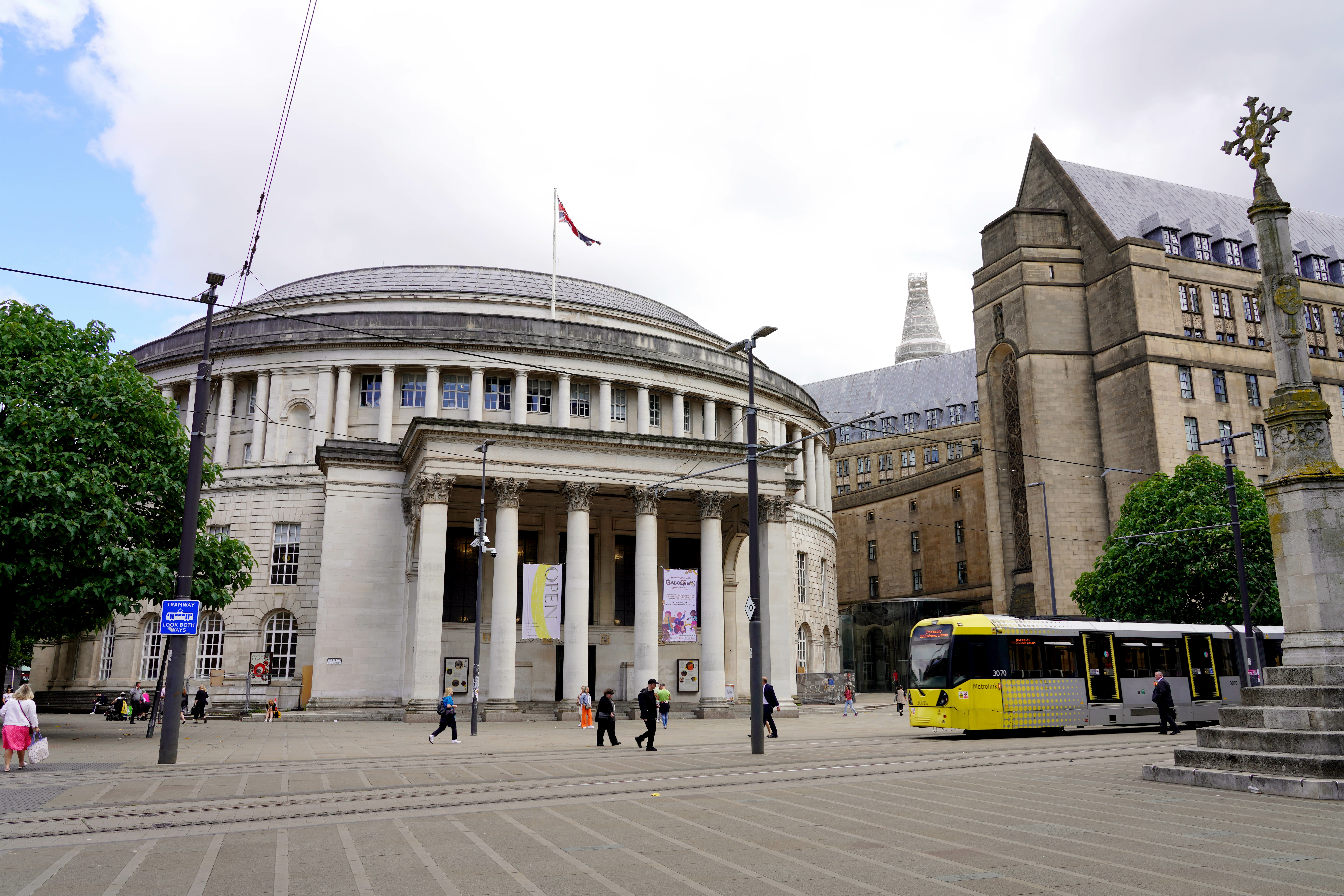 Manchester Central Library with tram running past